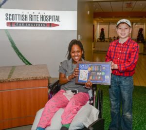 Micah Pinson giving toys