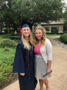 Clara (left) with her sister at the Founders Classical Academy of Leander graduation.